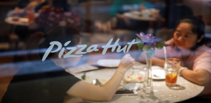 Pizza Hut sold to new owners for $2.7 billion Pizza Hut sold to new owners for $2.7 billion