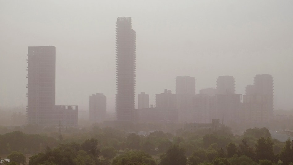Visibility fell sharply as dust clouds engulfed roads and residential areas Visibility fell sharply as dust clouds engulfed roads and residential areas
