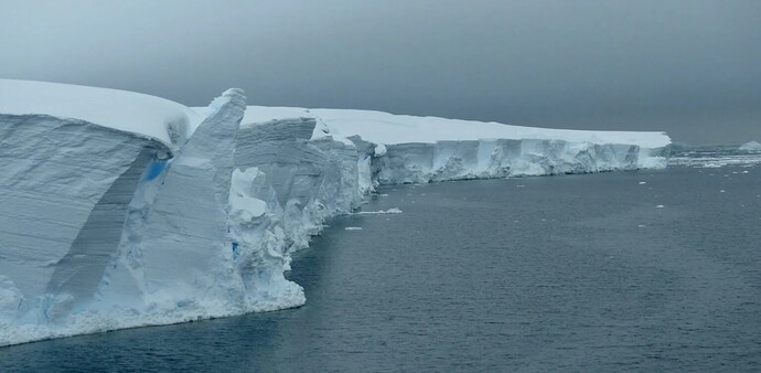 Scientists now warn that the eastern ice shelf of the Thwaites Glacier — often called the "Doomsday Glacier" — could break apart as early as next year. Scientists now warn that the eastern ice shelf of the Thwaites Glacier — often called the "Doomsday Glacier" — could break apart as early as next year.