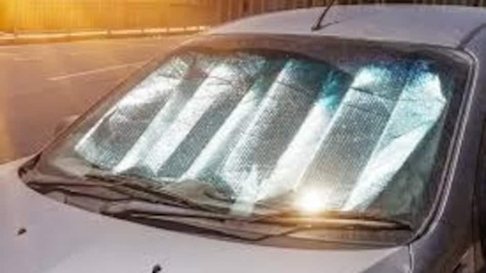 A windshield sunshade is designed to block sunlight from entering through the front windshield A windshield sunshade is designed to block sunlight from entering through the front windshield
