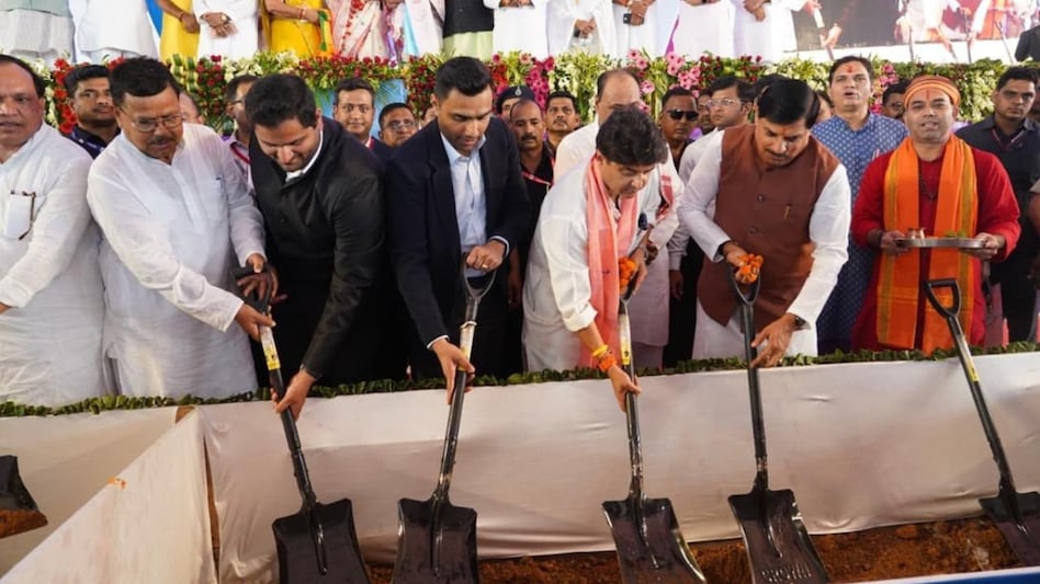 The groundbreaking ceremony was attended by Union Minister Jyotiraditya Scindia, CM Mohan Yadav, Madhya Pradesh Energy Minister Pradyuman Singh Tomar, MD of APSEZ Karan Adani and Director of Adani Defence & Aerospace Jeet Adani. The groundbreaking ceremony was attended by Union Minister Jyotiraditya Scindia, CM Mohan Yadav, Madhya Pradesh Energy Minister Pradyuman Singh Tomar, MD of APSEZ Karan Adani and Director of Adani Defence & Aerospace Jeet Adani.