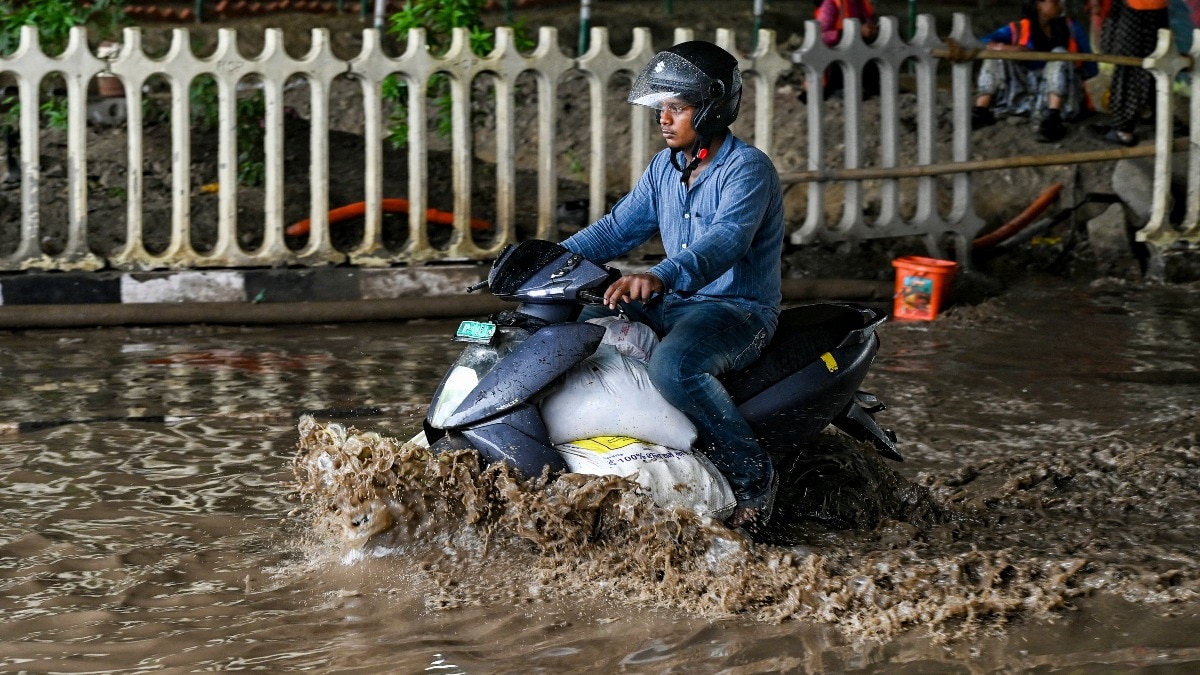 Knee-deep water, streets flooded, uprooted trees: Heavy rain batters Delhi under IMD red alert