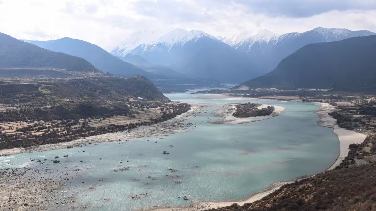 The Yarlung Tsangpo flows into India as the Brahmaputra River before continuing into Bangladesh, making it a vital transboundary river.