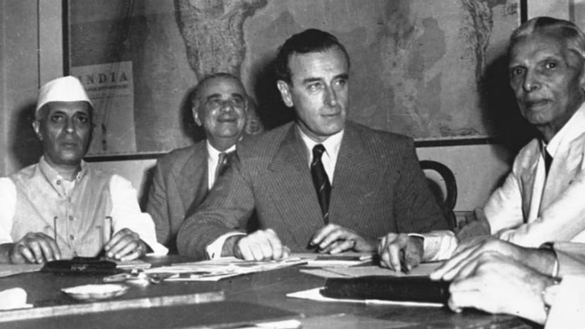 According to accounts of his time in India, Radcliffe (second from right) was deeply disturbed by the violence and later destroyed his papers and declined his fee.