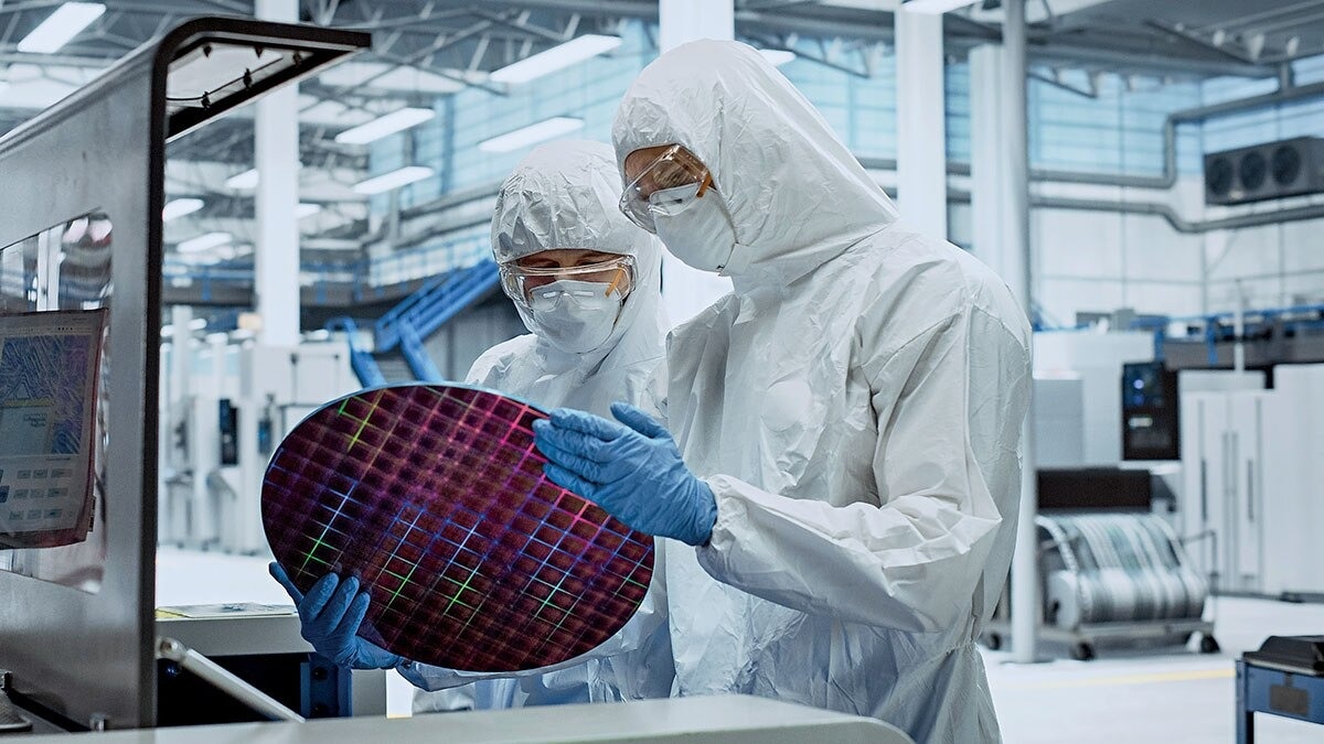 Silicon produced through crystal growth is formed into a large cylindrical single-crystal ingot.