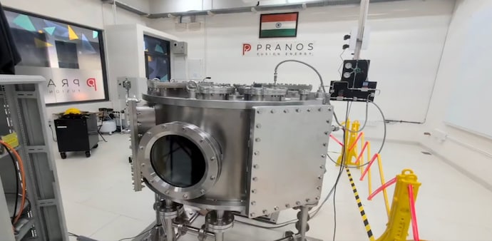 A tokamak is a doughnut-shaped fusion machine that uses powerful magnetic fields to confine plasma. A tokamak is a doughnut-shaped fusion machine that uses powerful magnetic fields to confine plasma.