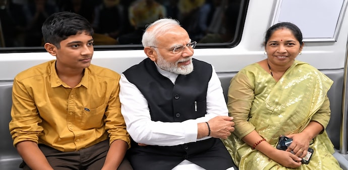 Prime Minister Narendra Modi travelled by the Delhi Metro on Saturday as he headed to Shri Ram College of Commerce Prime Minister Narendra Modi travelled by the Delhi Metro on Saturday as he headed to Shri Ram College of Commerce