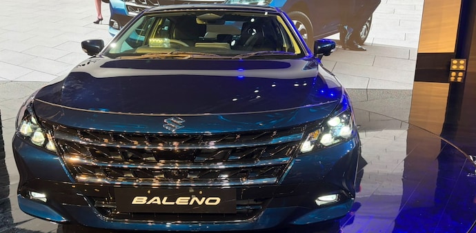 The new Baleno features a redesigned front fascia with a new grille, a sculpted front bumper, revised lower grille and chrome-finished fender garnish. The new Baleno features a redesigned front fascia with a new grille, a sculpted front bumper, revised lower grille and chrome-finished fender garnish.