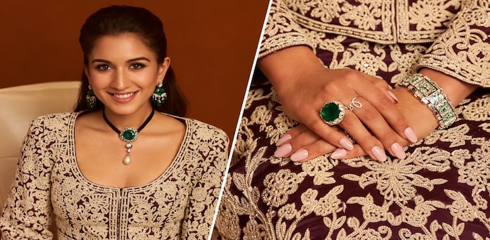 The accessories also included a pair of earrings and a large neckpiece featuring a striking pendant. The accessories also included a pair of earrings and a large neckpiece featuring a striking pendant.