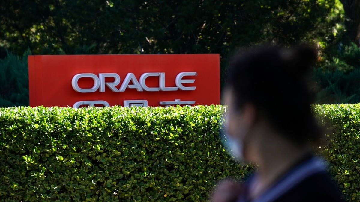 Oracle employee loses job after 12 years as wife seeks new opportunities through LinkedIn.