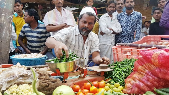 Shakil Ahmed, once a weaver, is now selling vegetables to earn a living. Shakil Ahmed, once a weaver, is now selling vegetables to earn a living.
