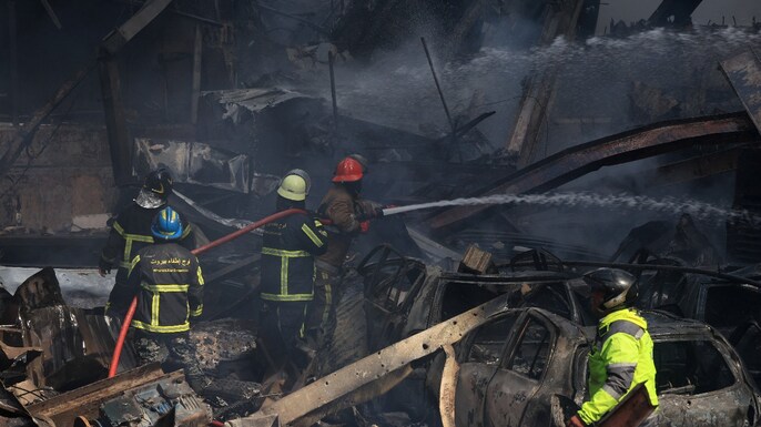 Rescuers work at the site of an Israeli strike in Beirut, Lebanon. (Photo: Reuters)