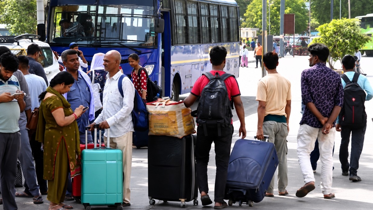 Commuters at New Delhi Railway Station.