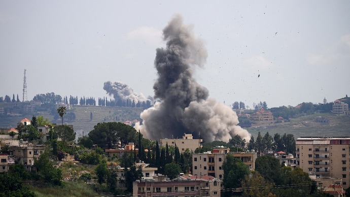 Smoke billows from southern Lebanon, following Israeli strikes, as seen from Nabatieh, Lebanon.
