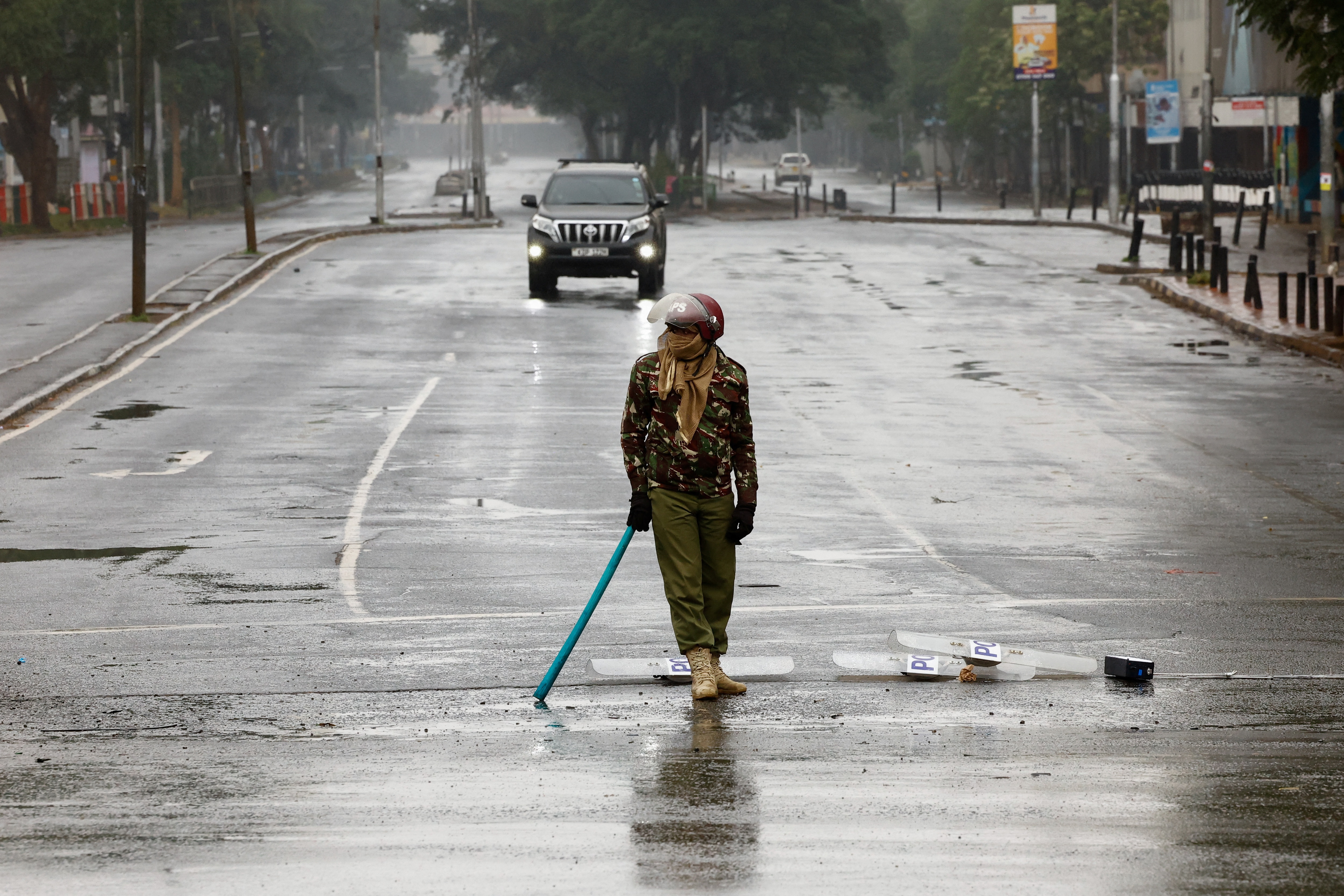 kenya anti-government protests democracy struggle police guarding road