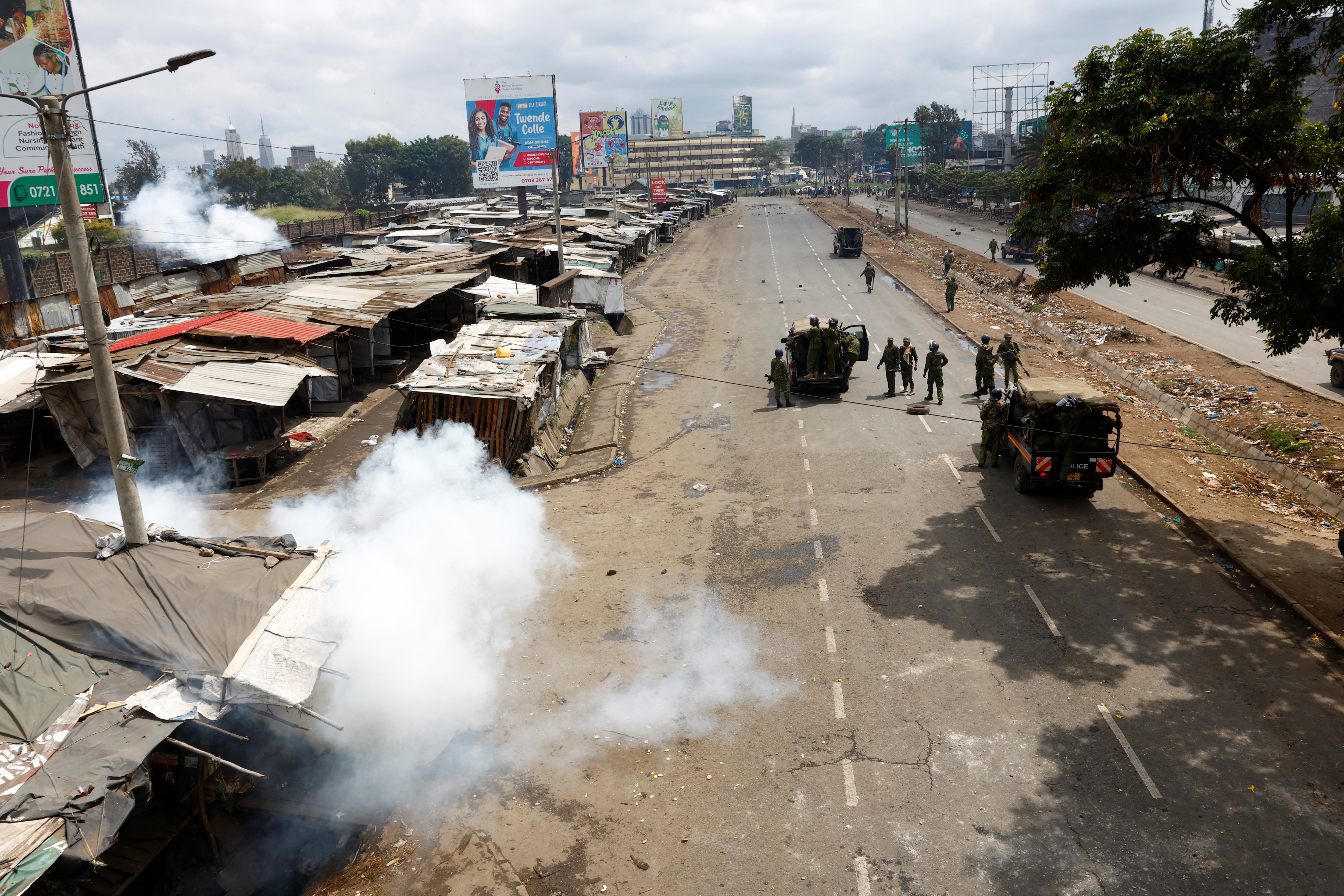 kenya anti-government protests democracy struggle police tear gas wide angle