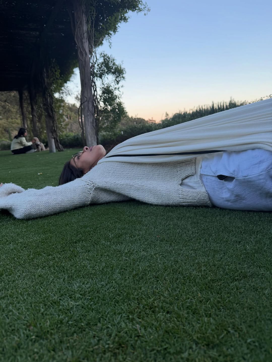 Priyanka lying on the grass.jpg