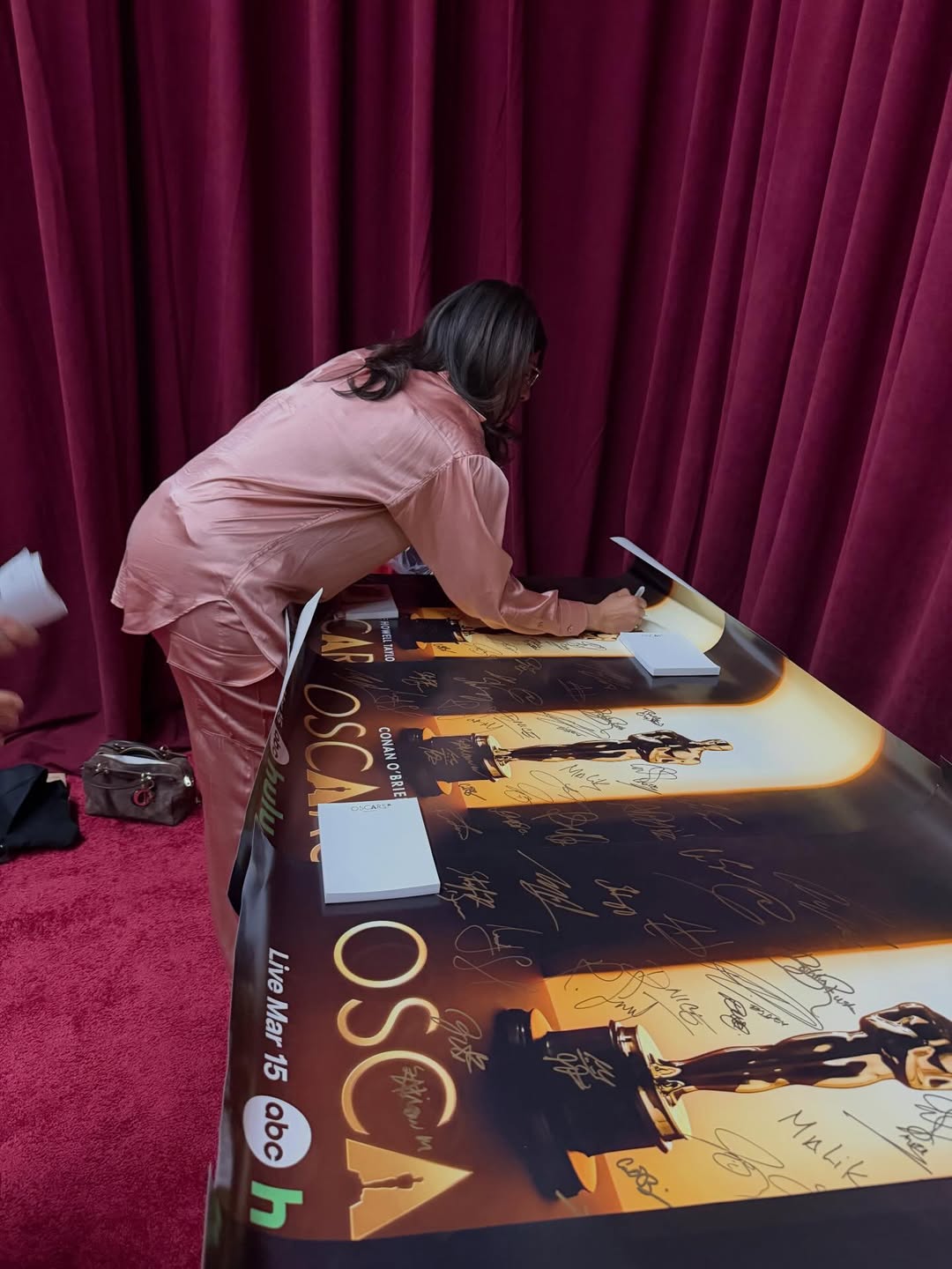priyanka_signing_posters.jpg