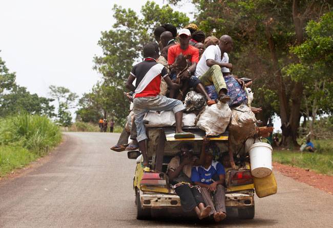 overloaded car with people