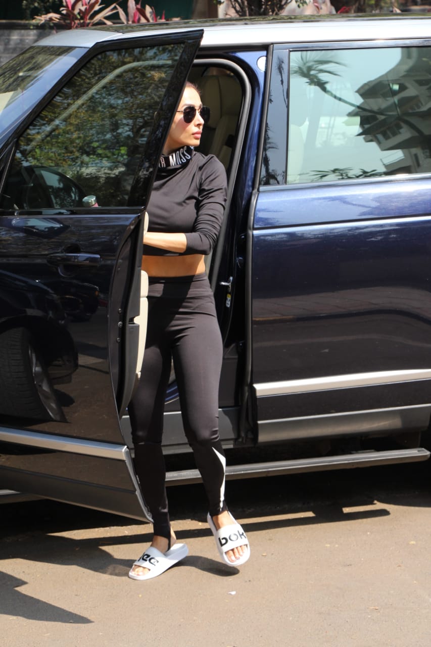 Malaika Arora Looks Uber Cool In Yoga Pants, Crop Top; Netizen