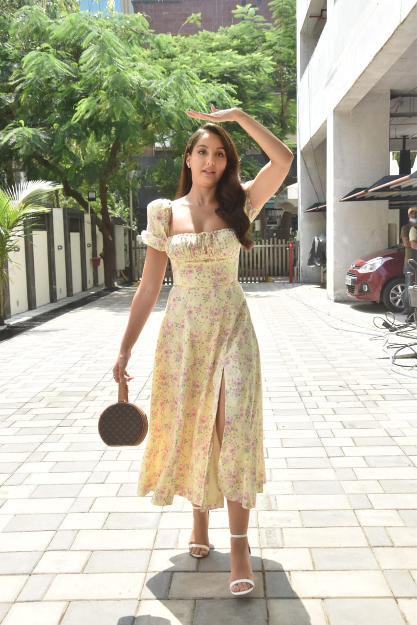 Nora Fatehi Travels Stylishly Well In A Mint Green Dress And A Rs 5.5 Lakh  Handbag