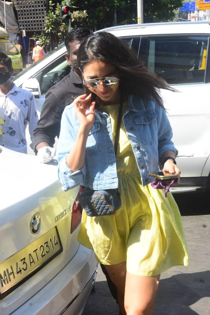 Rakul Preet pairs yellow mini dress with denim crop jacket and Rs