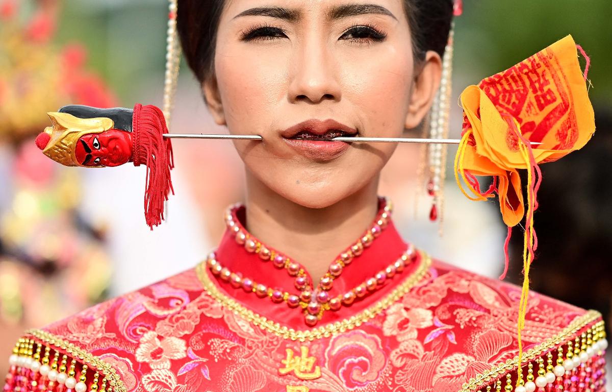 Vegetarian festival of extreme piercing begins in Thailand| Pics  