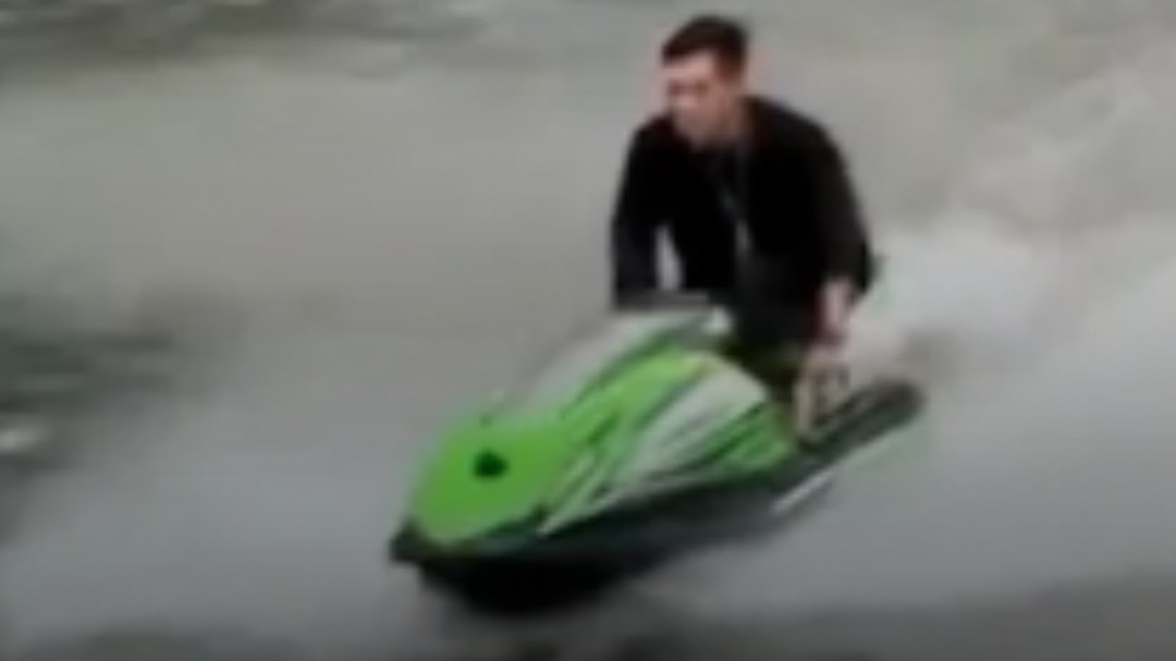 Man charged for jet skiing through flood-hit Bangkok