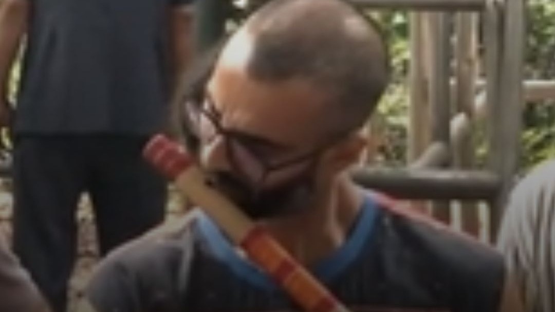 This protester's response to being hit by police was music