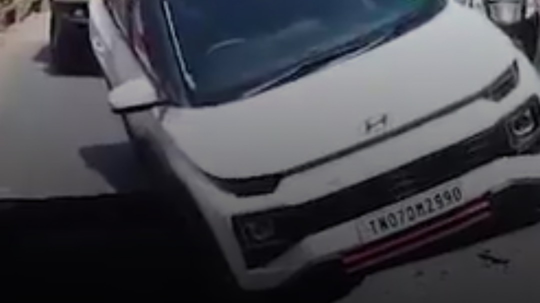 This car ended up in a crater after a Chennai road caved in