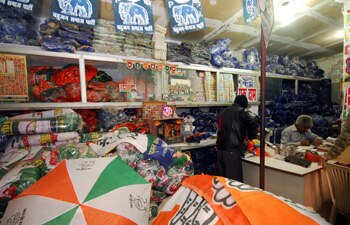 A shop with campaign material of various parties.