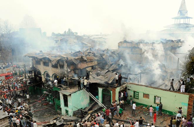 Residents help firefighters extinguish the fire