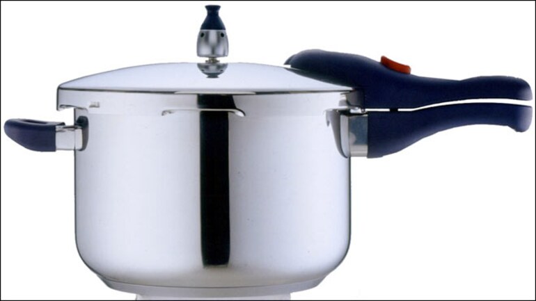 This Bihar Official Cooked Food In Silver Pressure Cooker India News