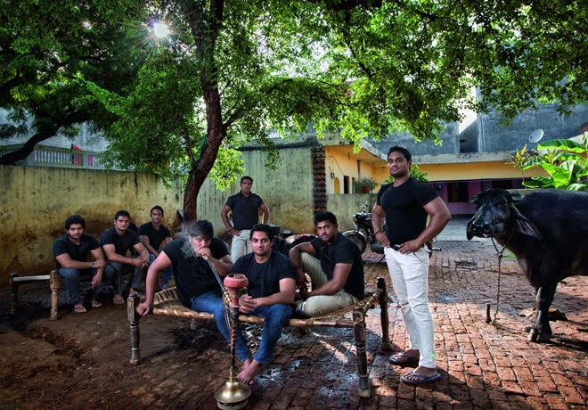 The Country of Musclemen: A village on the outskirts of Delhi provides the young men who protect the city's pubs, parties and nightclubs