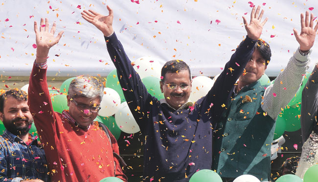 AAP chief Arvind Kejriwal with Ashish Khetan, Ashutosh and Kumar Vishwas after results on Tuesday.