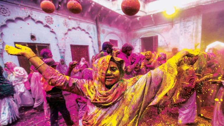Widows daub themselves in colours in Vrindavan - India News