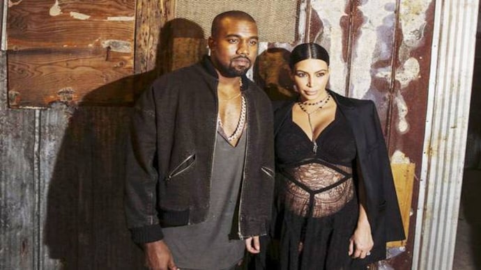 Kim Kardashian flaunts baby bump in sheer dress - India Today Kim Kardashian flaunts baby bump in sheer dress - India Today