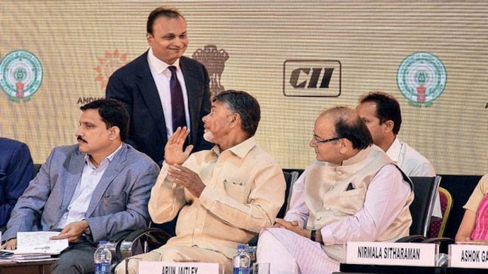 Anil Ambani greets Andhra Pradesh Chief Minister N Chandrababu Naidu and Union Finance Minister Arun Jaitley at the 22nd CII partnership summit in Visakhapatnam