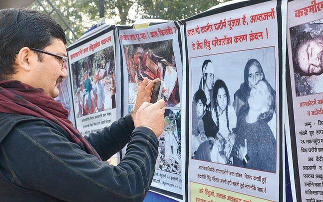 Can government ensure safe return of Kashmiri pandits post Burhan killing? - Mail Today News