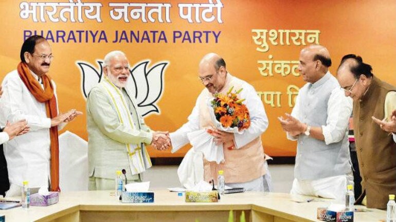 BJP's top leadership comes together to brainstorm over CM picks for UP and Uttarakhand - Mail Today News