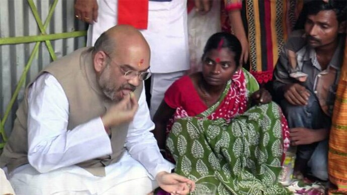 Amit Shah had lunch at BJP workers' house in Naxalbari. Bengal BJP workers who lunched with Amit Shah at Naxalbari join Mamata's Trinamool Congress