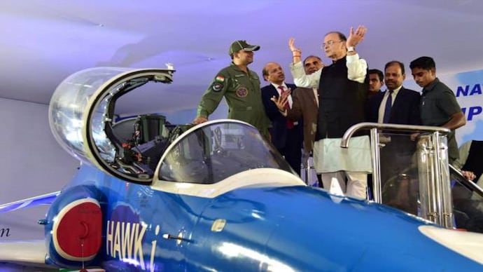 Arun Jaitely having word with a pilot during the launch of Hawk-i in Bengaluru. (PTI Photo) 