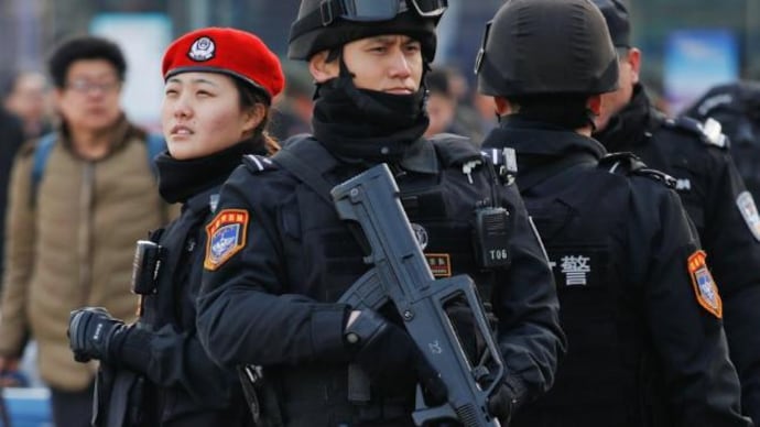 Members of a police SWAT team in China. Source: Reuters In China, SWAT teams, GPS and 7-year jail terms stop leaking of exam papers