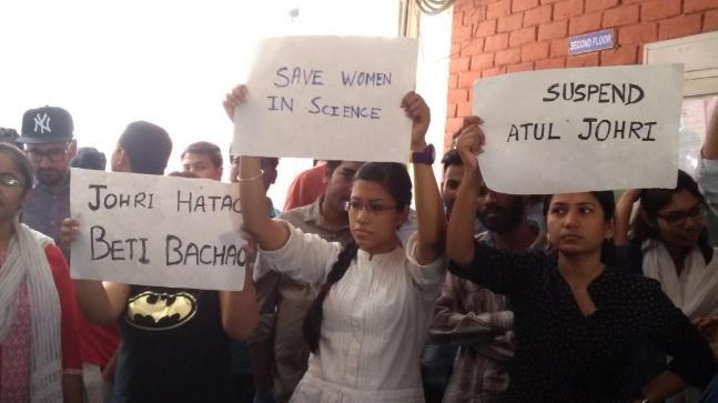 JNU students demanding suspension of the professor accused of molestation.