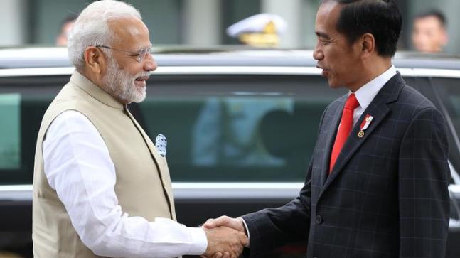 PM Narendra Modi shakes hands with  President of Republic of Indonesia, Joko Midodo at Jakarta