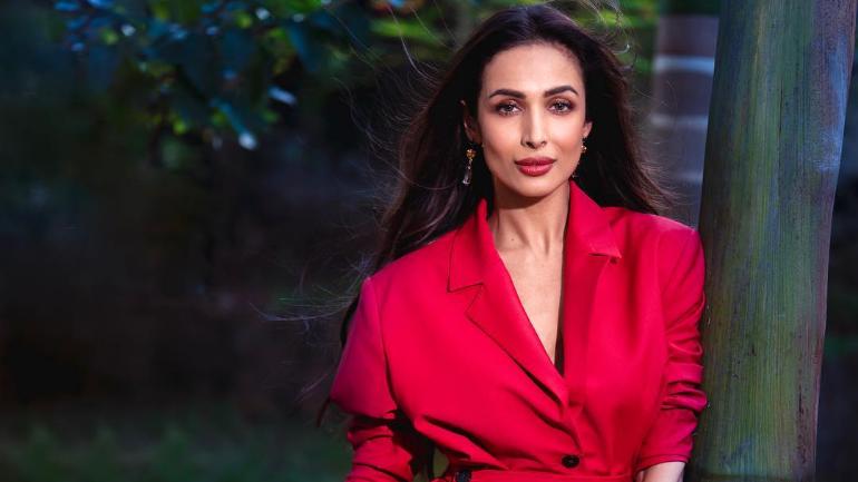 malaika arora glows in