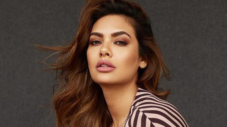 Whats there to hide Esha Gupta goes the crop top way to bare her sexy  midriff and tattoo