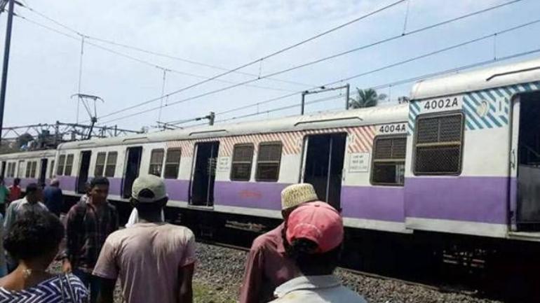 Local train derails in Mumbai