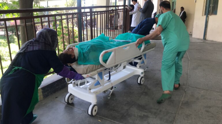 Hospital employees transport a wounded woman after a blast in Kabul, Afghanistan July 25, 2019. (Photo: Reuters
