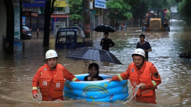 Heavy rain, floods in China force evacuation of nearly 80,000 - World News